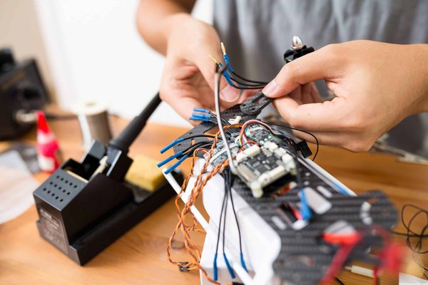 How can real estate developers use drone technology for more efficient site surveying and project monitoring?